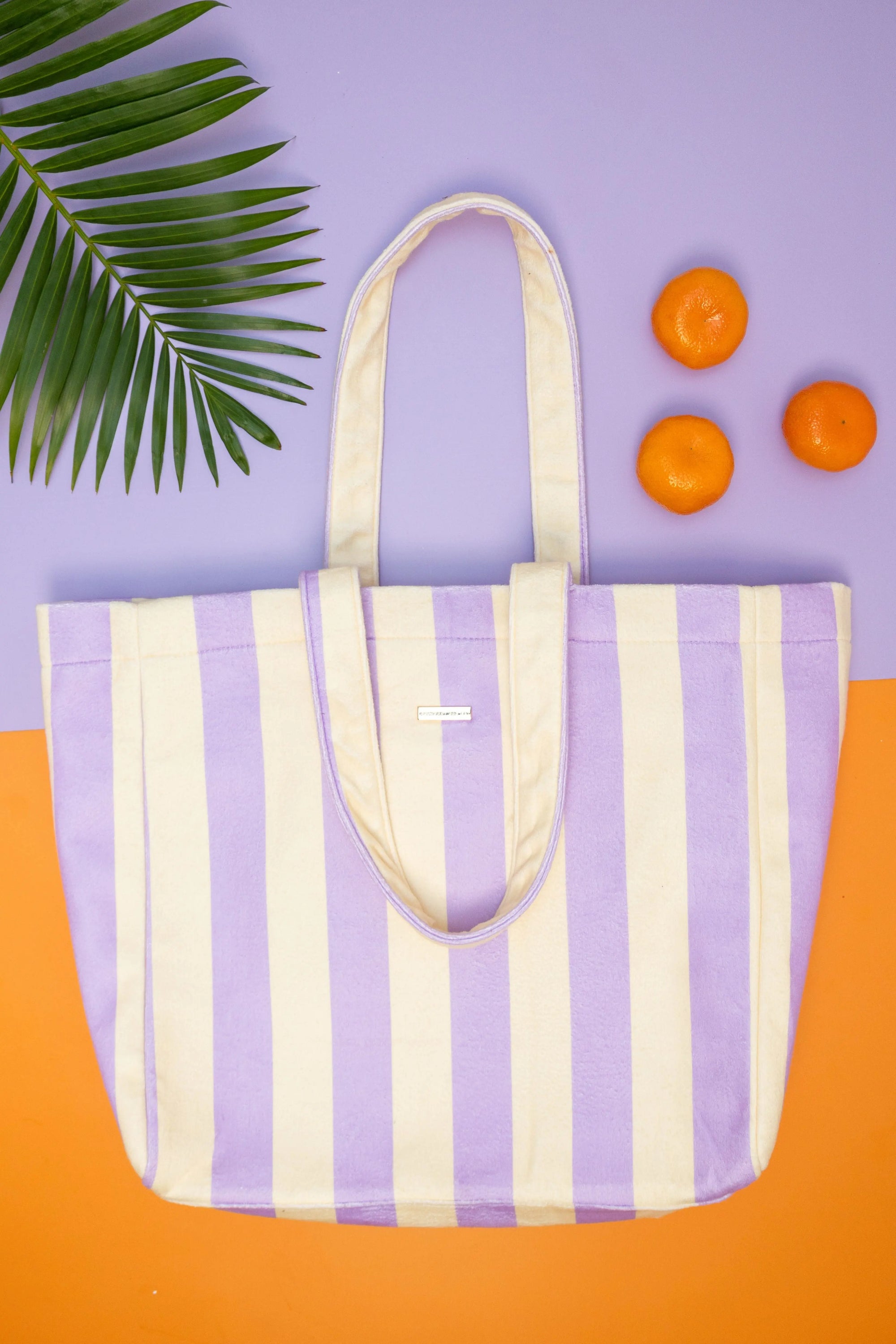 Large terry towelling carry-all tote bag with wide shoulder straps for beach and everyday use